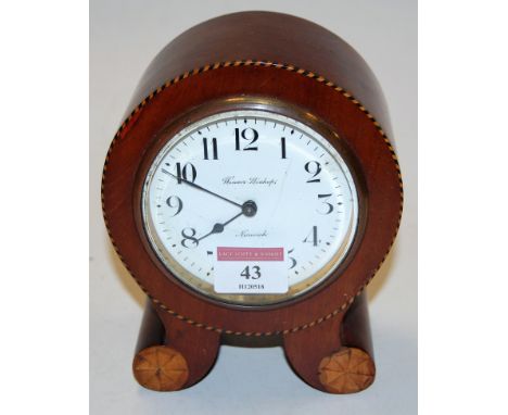 An Edwardian mahogany satinwood inlaid and chequer strung mantel clock of circular form having an enamelled dial with Arabic 