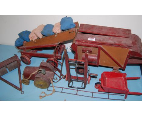 A collection of mid 20th century wood and metal proprietary built farming models and accessories to include hay elevator and 