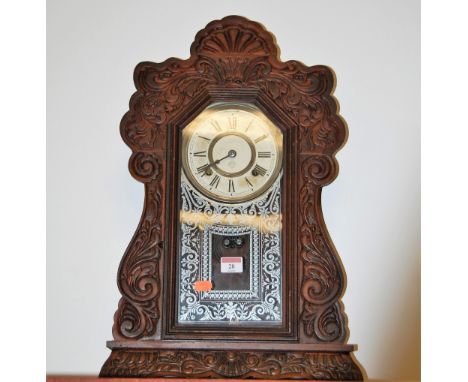A late 19th century American mantel clock by The Ansonia Clock Company of New York, having a paper dial with Arabic numerals 