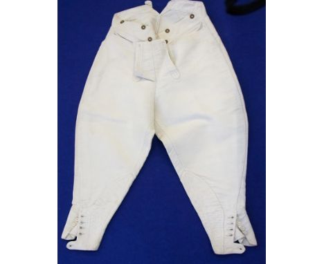 A large quantity of mainly gentleman's hunting breeches including a dog toothed check pair, labelled "Hamper & Fry Hunt Tailo