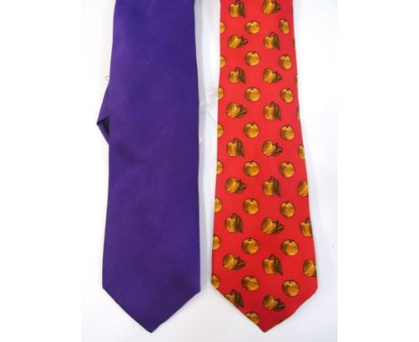 A Burberry purple silk tie and a Yves Saint Laurent apple decorated silk tie (2) 
