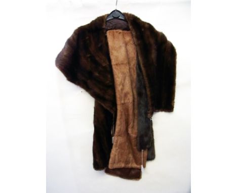 A vintage mink stole, a brown squirrel stole by M. Mlinaric, Bond Street, London and a dark mink scarf (3) 