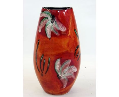 A Poole pottery Delphis vase, artist's signature, decorated with a floral pattern, 27cm high 