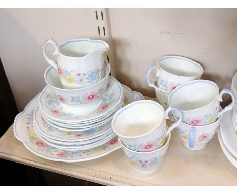 Susie Cooper bone china floral decorated tea service, Elizabethan bone china "Calypso pattern" part tea service and Colclough