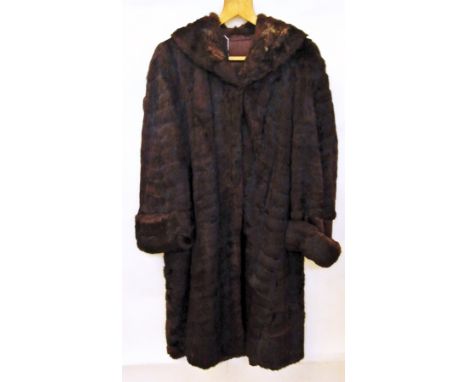 A full length vintage fur coat 