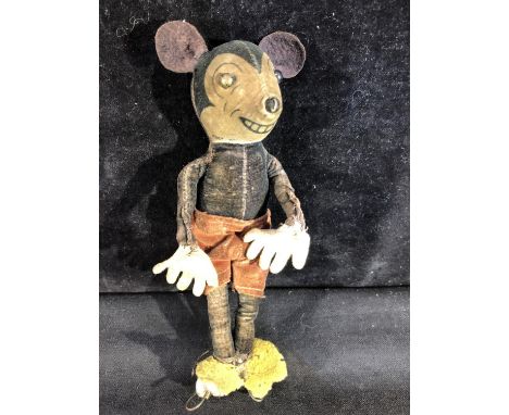 An early Mickey Mouse Doll made by the Deans Rag Book Company, plush, felt and velveteen materials over a wire frame, metal b