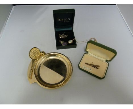 A silver and enamel Musketry medallion; a modernist pewter brooch stamped FUSION, in original box; a silver mounted pendant a