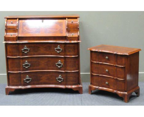 A reproduction walnut serpentine fronted bureau, 104 x 105 x 53cm; together with a similar small chest of three long drawers,