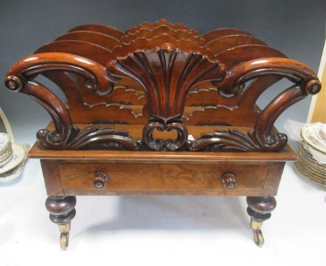 A William IV walnut canterbury on turned legs and castors, 48 x 55 x 39cmKnocks to extremities especially around the legs and