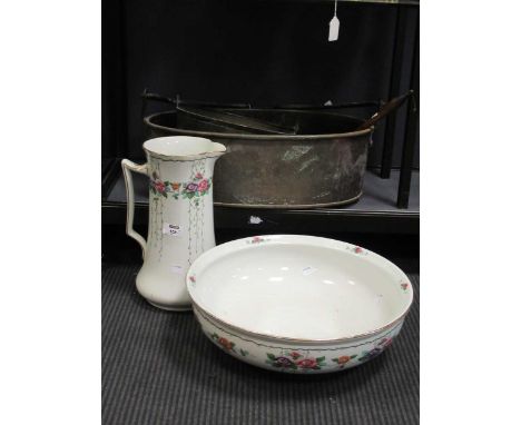 A floral decorated wash bowl and jug, by Aden Adderleys; together with an oval metal bucket, pewter wooden handle serving spo