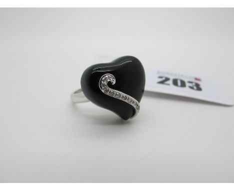 A Modern Stylish Diamond Set Heart Dress Ring, stamped "585" (finger size O). 