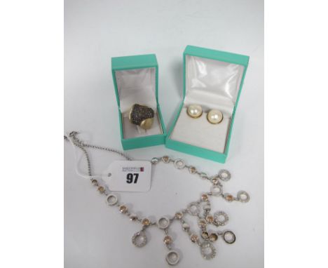 A Modern Dress Necklace, of graduated drop design, with inset highlights, stamped "925"; A Cocktail Dress Ring, of abstract s
