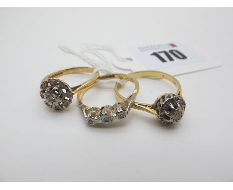 An 18ct Gold Cluster Ring, together with two further rings stamped "18" (damage) (8.9grams). (3) 