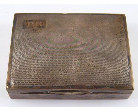 A silver cigarette case with domed engine turned lid, 11x8cm. wt. 190gm. 