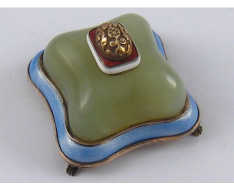 A Russian silver table bellpush , the yellow metal button with small champleve red platform on a shaped jade cushion over a b