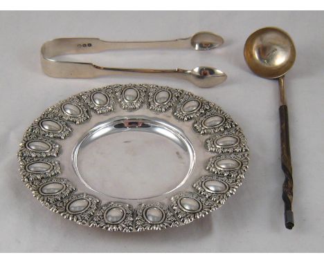 An embossed silver , marked 925, pin dish, 14cm. across, a small silver toddy ladle with baleen handle, incomplete marks, cir