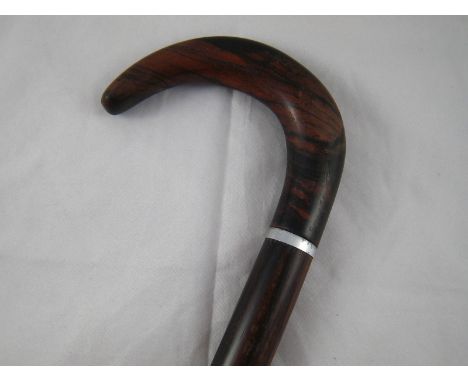 A coromandel or rosewood walking stick. length 91cm. 