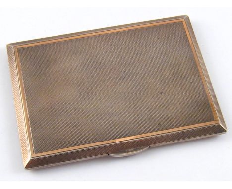 A silver cigarette case with engine turned decoration, Birmingham 1952, approx. 11.5 x 8.5 cm, 180 gms.
