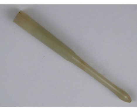 A Chinese white jade cigarette holder, approx 14.5cm long.