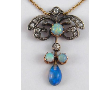 An Edwardian opal and diamond pendant on a gold chain,  and set with opals and diamonds, pendant approx. 3cm drop, chain appr