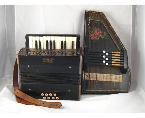 A piano accordion,"The National Band", with one and a half octave keyboard, eight buttons and shoulder strap, together with a