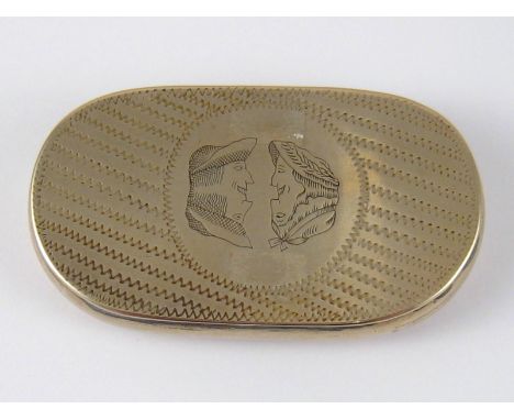 A 19th. century brass oval snuff box , the base engraved with a comic double view of a couple.  8x4.5cm. 