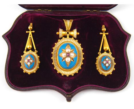 An extremely fine suite of Victorian gold jewellery comprising earrings and locket back pendant, set with untested pearls, tu