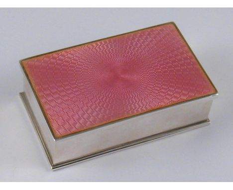 An American silver, marked sterling, double stamp box, the lid with radiating engine turned pink enamel. 7x4x2cm. 