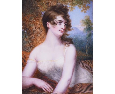 SAMUEL JOHN STUMP (BRITISH, 1779-1863)Portrait miniature of a lady in a wooded landscape, lying on a tiger skinbears label in