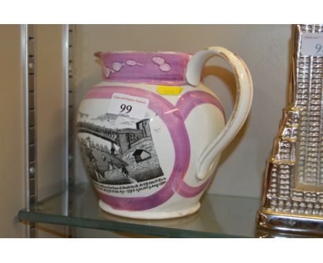 A Sunderland lustre ware jug decorated with a view of the Cast Iron Bridge and a mariners compass