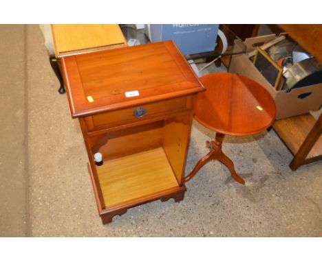 A reproduction yew wood bookcase fitted single drawer and a small occasional table