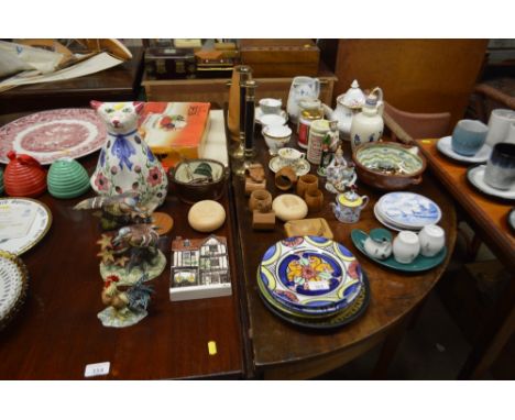 A quantity of various decorative china and wooden ware to include carved serviette rings; a pair of candlesticks; a Royal Alb