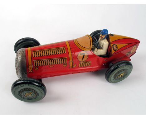1950s Mettoy 'Giant' clockwork tin plate racing car A clockwork open top racer with tapering, red bodywork with yellow litho 