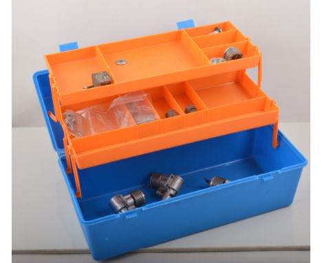 Blue plastic work box containing five PAW 1.5cc engines and one PAW 100 R/C plus sundry spares.