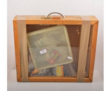 Display case containg engine spares, misceallaneous accessories.