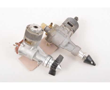 Two diesel engines KM 2.5cc team race, and unknown race engine.