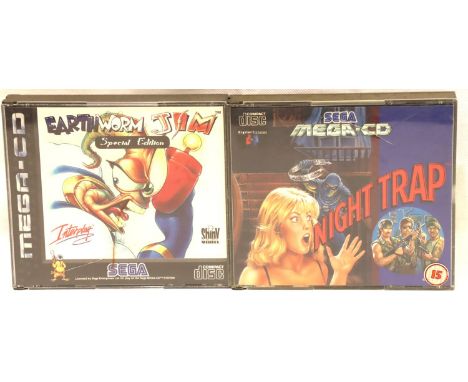 Two Sega Mega CD games; Earthworm Jim (Special Edition) and Night Trap. Complete with instructions. P&amp;P Group 1 (£14+VAT 