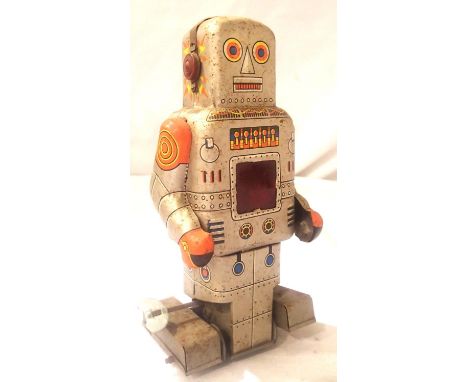 S.Y. Toys Japan, clockwork walking, sparking tinplate robot, fixed key, working, overall light corrosion. P&amp;P Group 1 (£1