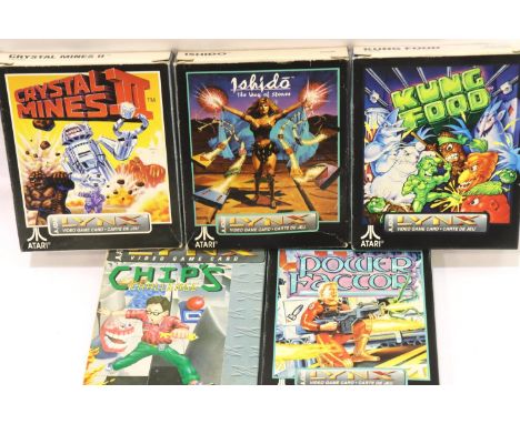 Five assorted Atari Lynx games boxed with instructions. P&amp;P Group 2 (£18+VAT for the first lot and £3+VAT for subsequent 