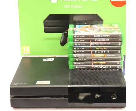 Microsoft Xbox One 500GB console, boxed with power cable, one controller and nine mixed games. P&P Group 3 (£25+VAT for the f