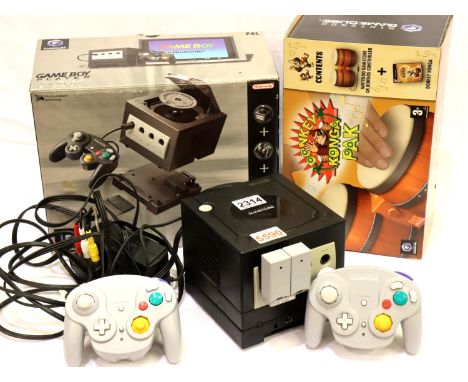 Nintendo Game Cube and Gameboy player, aftermarket wireless controllers, Bongos (no game) and power supply/leads. P&P Group 3