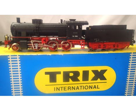 Trix 2425, D.B. Black/Red 2.6.0. and tender, 54-1556, in very good to excellent condition. P&amp;P Group 1 (£14+VAT for the f