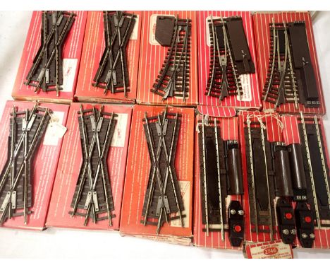 Hornby Dublo three two rail points , five diamond crossings, three electric uncoupler rail, all in good condition, boxed. P&a