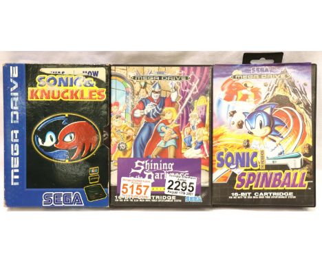 Three Sega Mega Drive games; Shining In The Darkness, Sonic Knocks, Sonic Spinball, all boxed with instructions. P&amp;P Grou