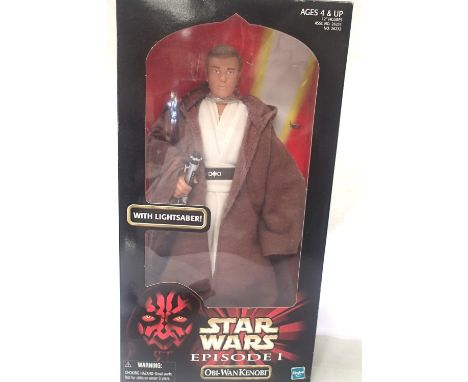 Hasbro Obi-Wan Kenobi doll with lightsabre, L: 30 cm. P&amp;P Group 1 (£14+VAT for the first lot and £1+VAT for subsequent lo