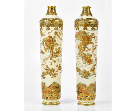 A pair of 19th century Satsuma vases of tapering form, decorated with stylised dragons, height 46cm.Condition Report: Light w