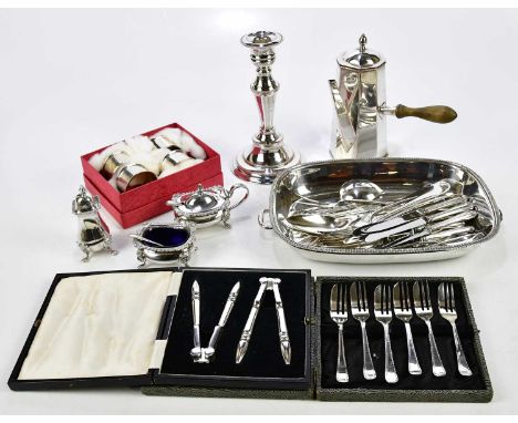 A small collection of silver plated items to include cased cutlery, a candlestick, napkin rings, a chocolate pot, etc.