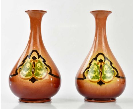 WILLIAM AULT; a pair of Art Pottery vases with stylised designs, impressed signature, height 29cm. (2). 