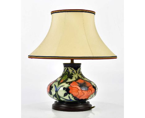 MOORCROFT; an 'Anemone' pattern lamp with shade, height 40cm.