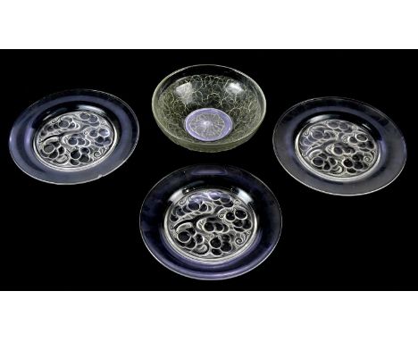 RENE LALIQUE; three clear glass plates in the ‘Marienthal’ pattern, diameter 23.5cm, and an Art Deco frosted and clear glass 